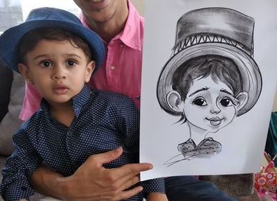 Caricaturist drawing baby